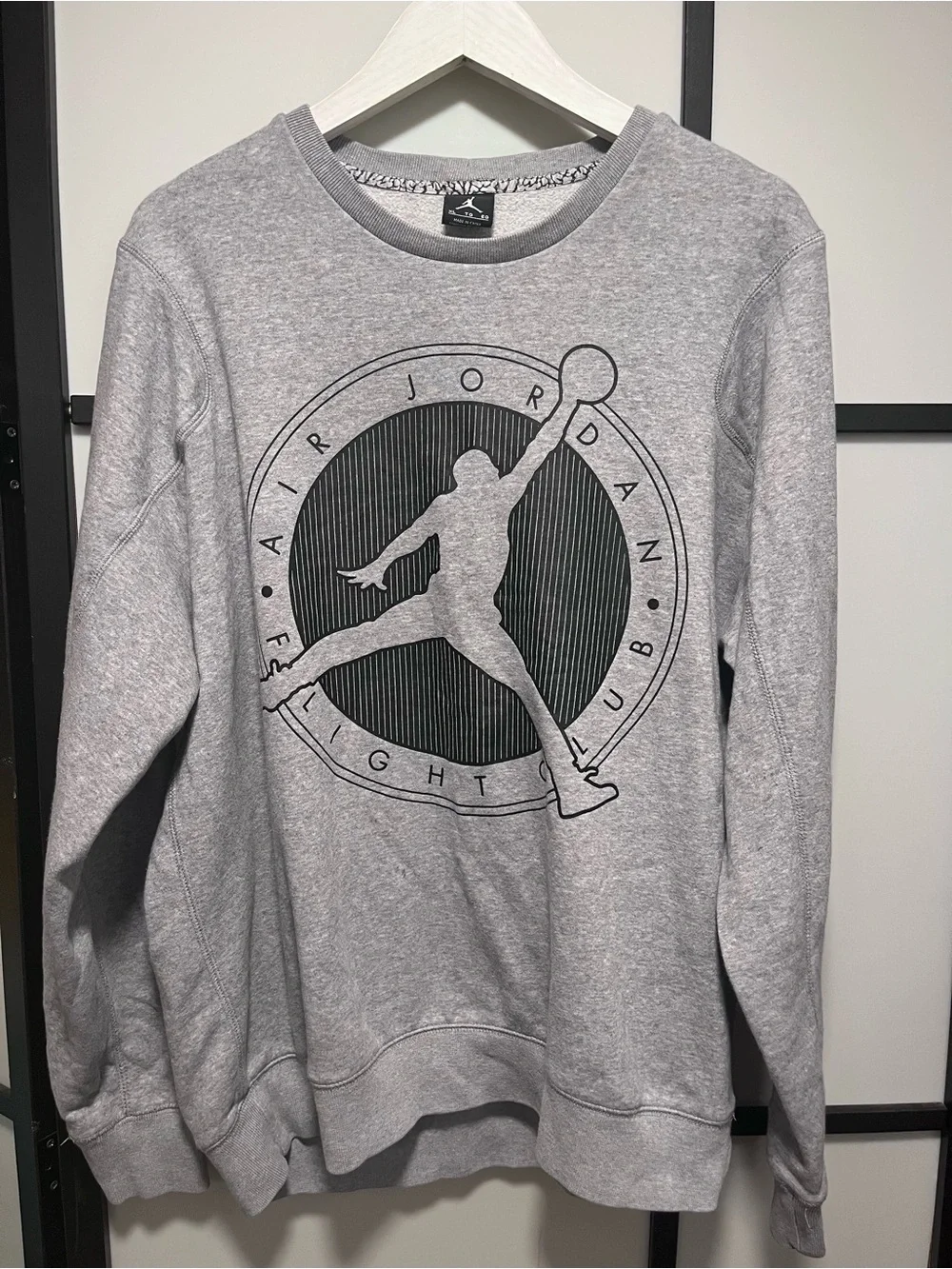 Classic Nike Air Jordan Flight Club crewneck sweatshirt in heather gray. Feature